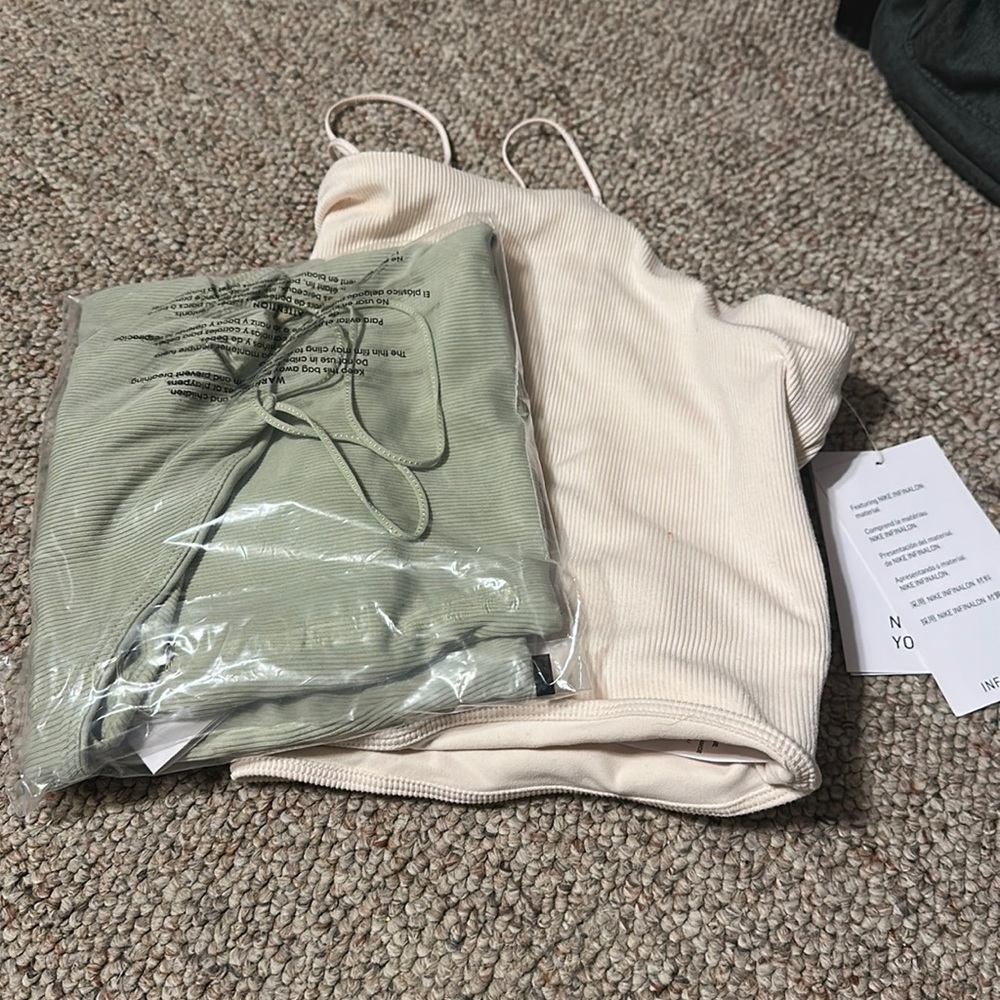 2 Nike yoga tops